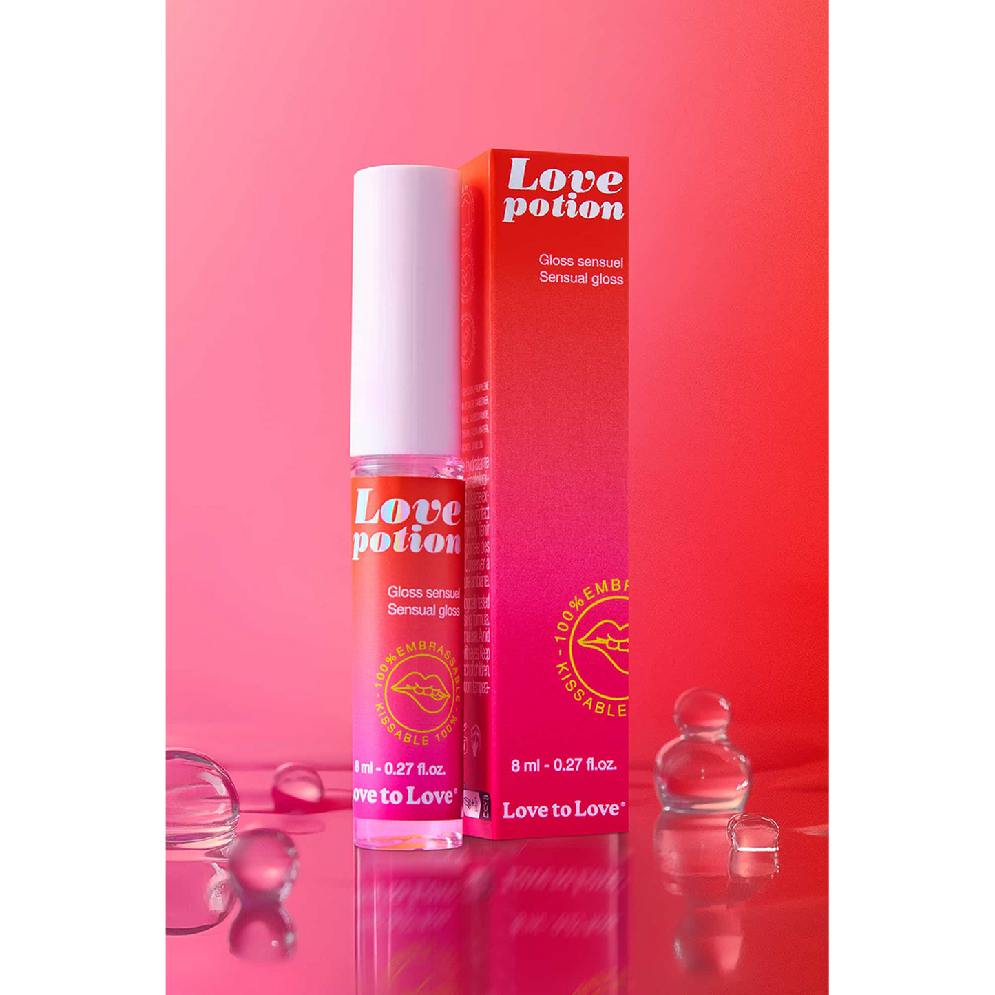 Flacon roll-on du gloss Love Potion et packaging rouge-rose avec illustration lèvres dorées - Oh My God'Z