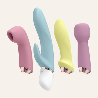 Têtes interchangeables du set Marvelous Four de Satisfyer en couleurs pastel, vendues par Oh My God'Z pour une expérience sensorielle avec sextoys de luxe.