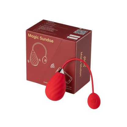 Œuf vibrant Magic Sundae de Magic Motion en rouge, avec sa boîte élégante. En vente chez Oh My God'Z, cet accessoire intime est parfait pour une utilisation en couple ou en solo avec un contrôle à distance via smartphone.