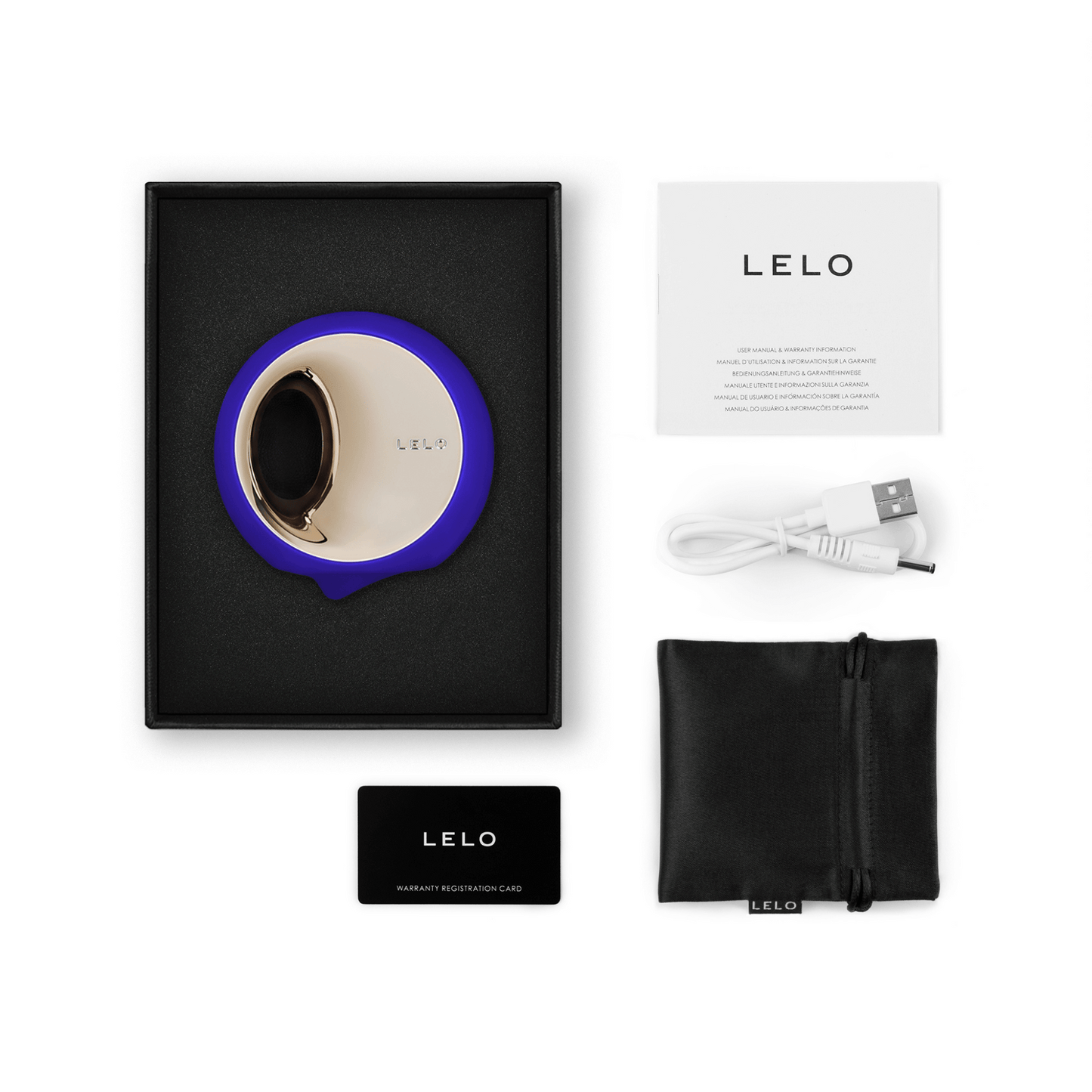 Packaging raffiné du Stimulateur clitoridien Ora 3 en bleu nuit de Lelo, incluant câble de charge et pochette de rangement, proposé par OhMyGodz.fr.