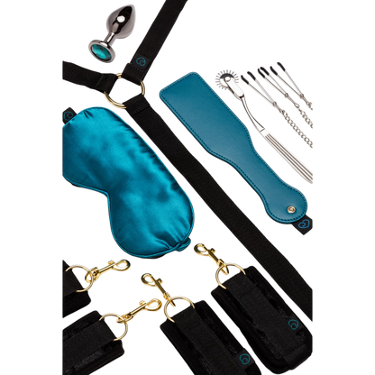 Accessoires bondage soft du calendrier Avent Luxury : masque satin bleu, menottes, paddle, plug et pinces - Oh My God'Z