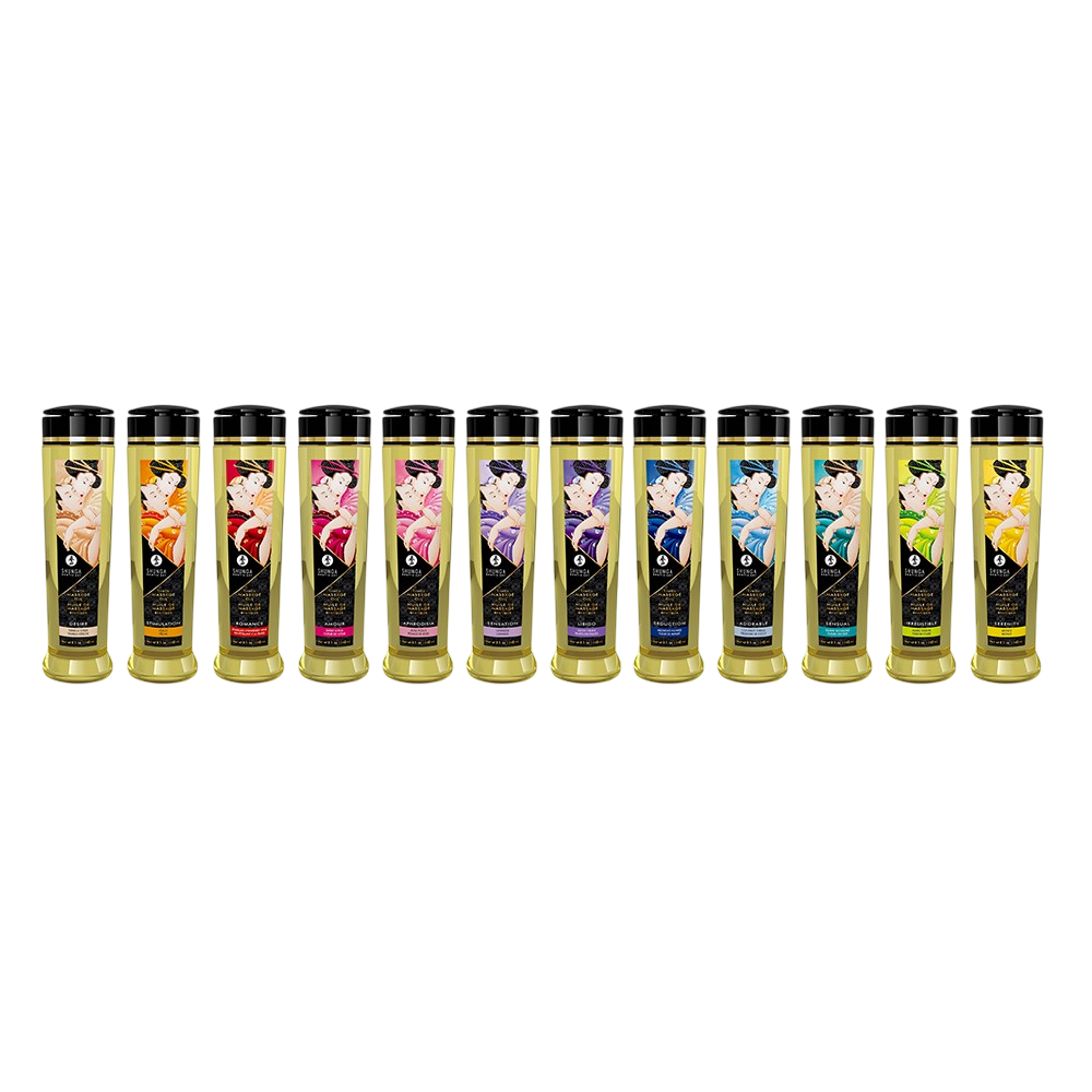 Gamme complete des huiles de massage Shunga 240 ml alignees, flacons dores a bouchons noirs, parfums varies - Oh My God'Z