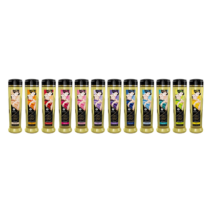 Gamme complete des huiles de massage Shunga 240 ml alignees, flacons dores a bouchons noirs, parfums varies - Oh My God'Z