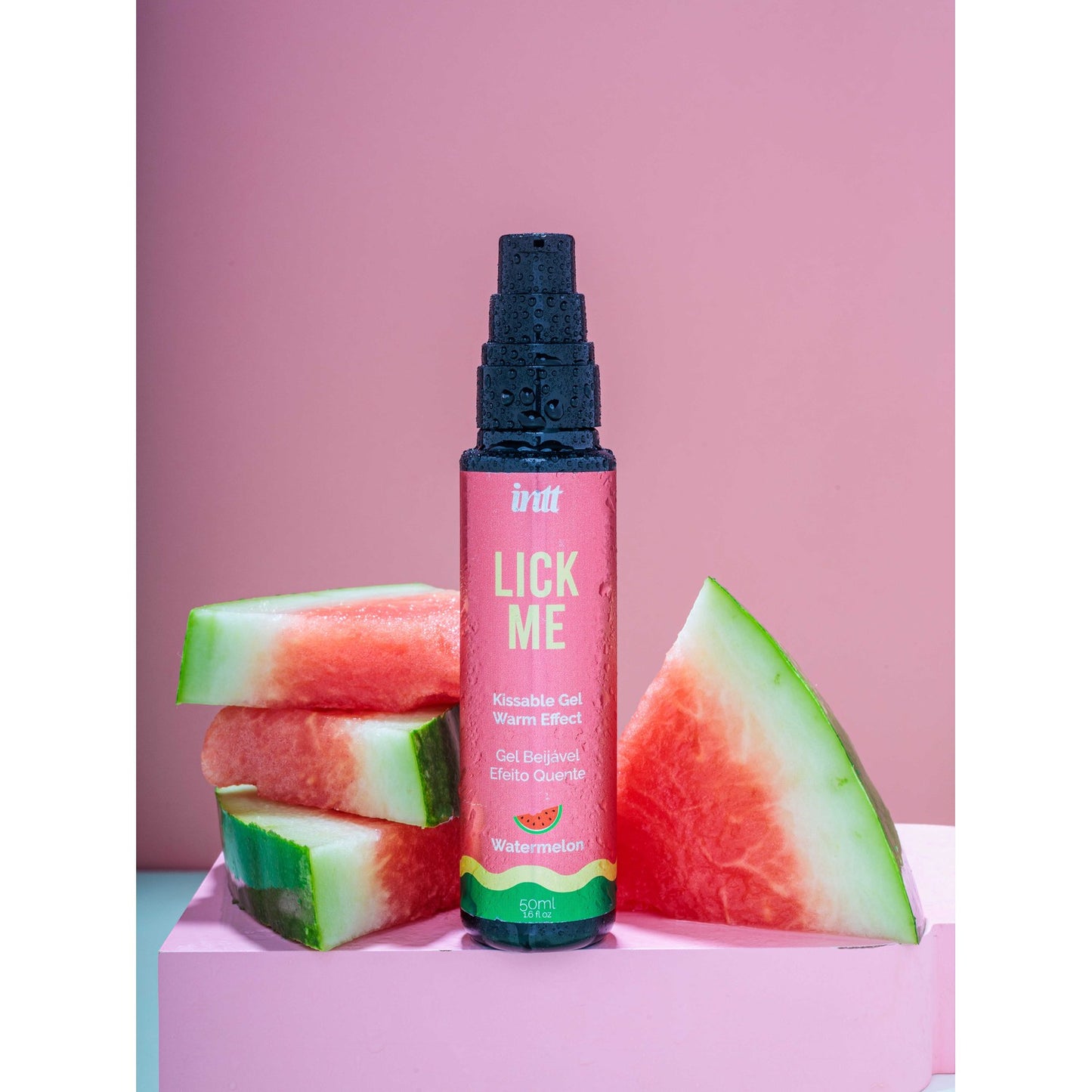 Gel chauffant embrassable Lick Me saveur pastèque, flacon rose et vert 50ml avec quartiers de pastèque - Oh My God'Z