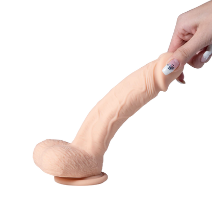 Gode Paxton chair flexible en silicone tenu en main, vue de côté sur fond blanc - Oh My God'Z