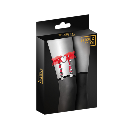 Packaging Bijoux pour Toi de la jarretière rouge BDSM avec cœur argenté, sur fond noir élégant - Oh My God'Z