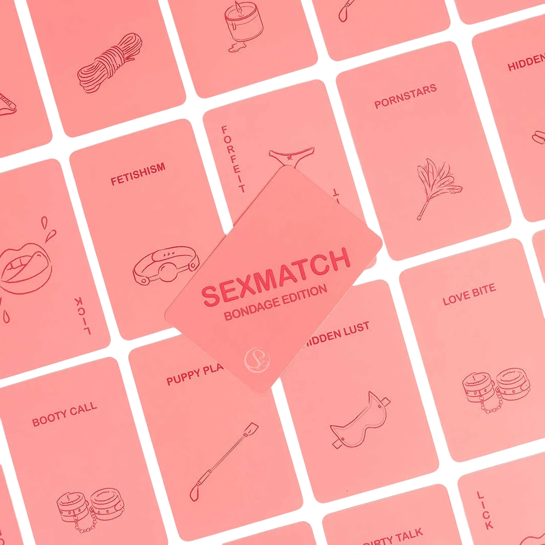 Cartes roses du jeu Sexmatch Bondage Edition étalées montrant illustrations et mots thématiques - Oh My God'Z