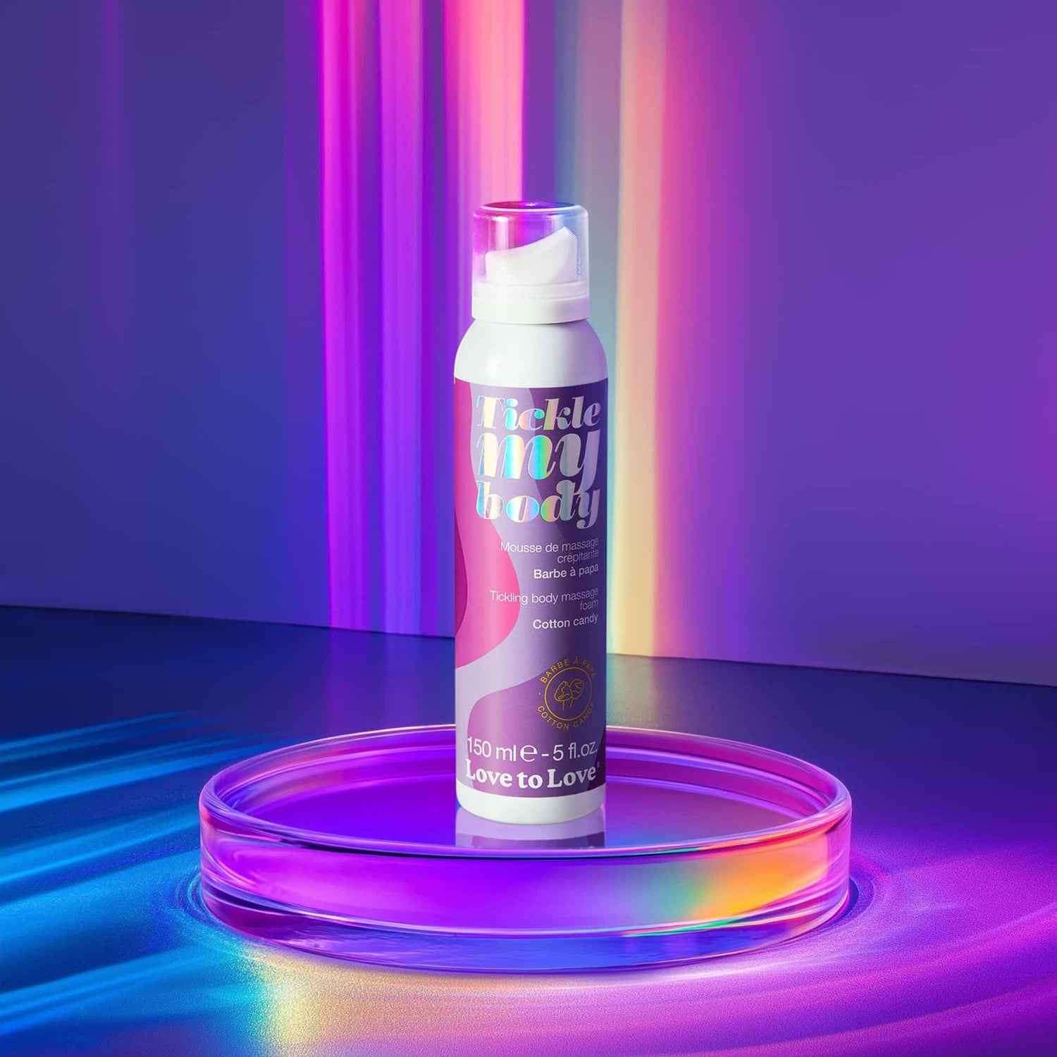 Flacon de mousse corporelle Tickle My Body barbe à papa sur plateau holographique, packaging violet et rose - Oh My God'Z