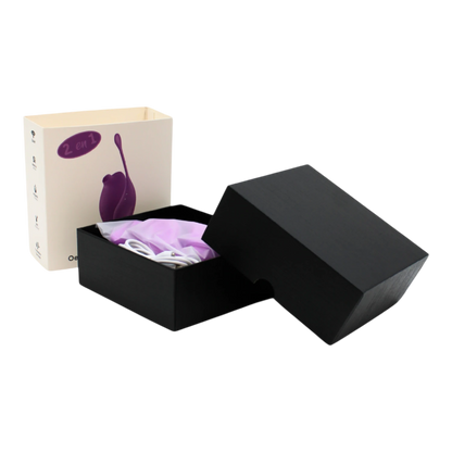 Packaging ouvert presentant le stimulateur violet et oeuf vibrant dans leur ecrin noir - Oh My God'Z
